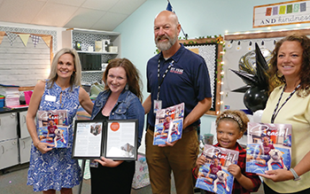 Teachers and students given Reach magazine from Region 10 ESC